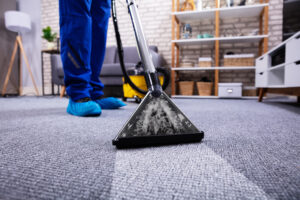 vacuuming carpet